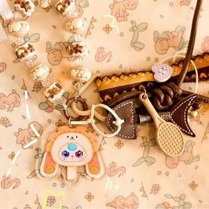 Baby Three Charming Character Key Holder with Brown and Cream Accents